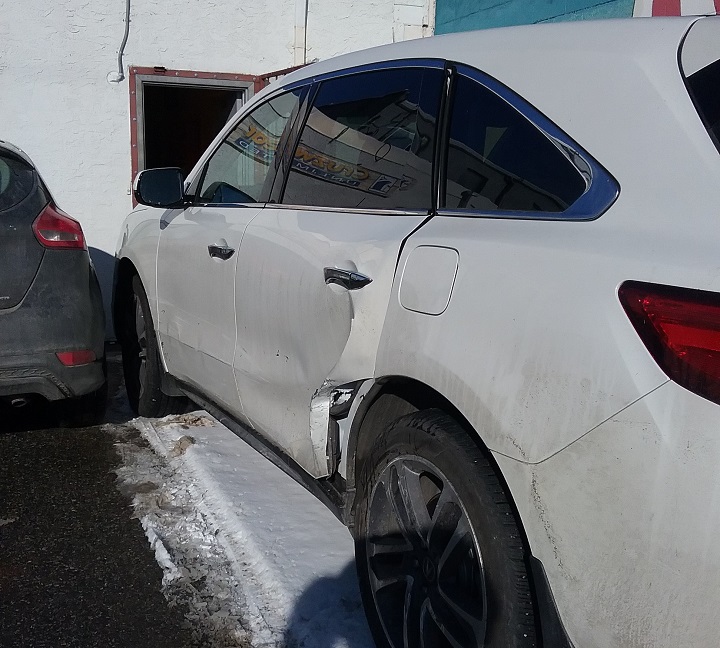 Car crashes into back of downtown Kelowna business ...