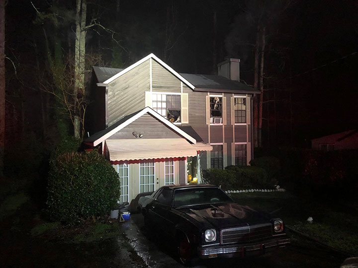Authorities responded to a call of a house fire in the Atlanta suburb of Lithonia after a “domestic-related incident.".