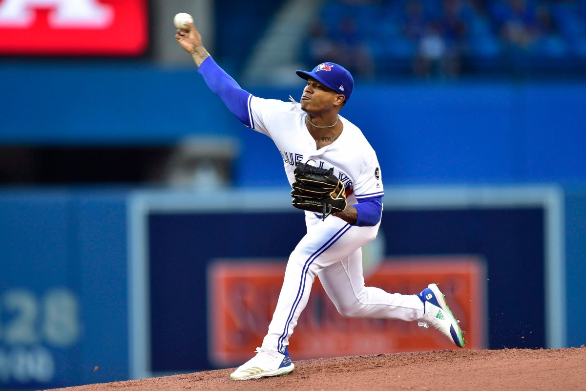 Toronto Blue Jays starting pitcher Marcus Stroman (6) pitches to the Tampa Bay Rays during first-inning American league baseball action in Toronto, Monday, Sept. 3, 2018.