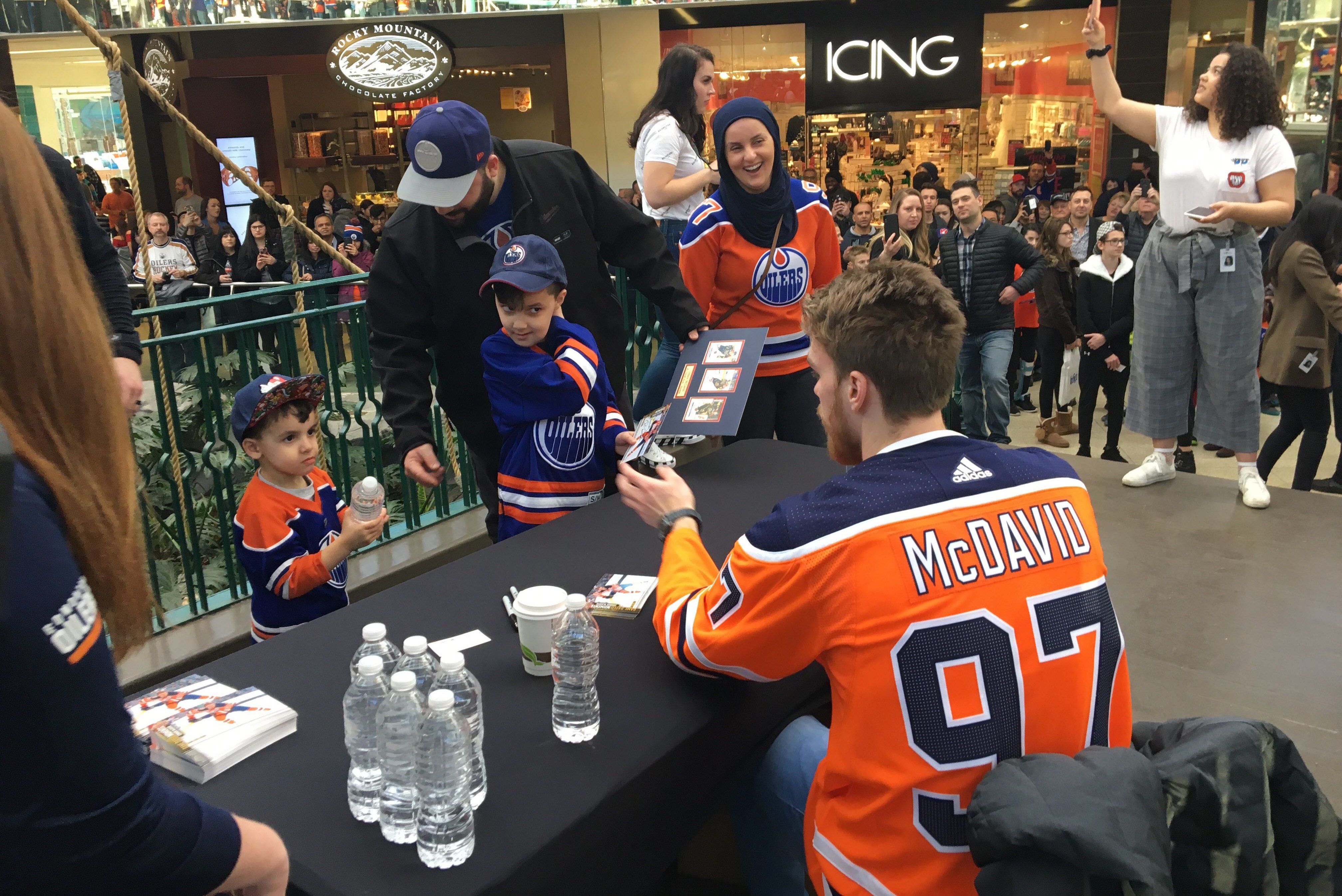 Edmonton Oilers captain Connor McDavid signing Upper Deck photos at the team's public autograph session at West Edmonton Mall on Monday, February 18, 2019. 