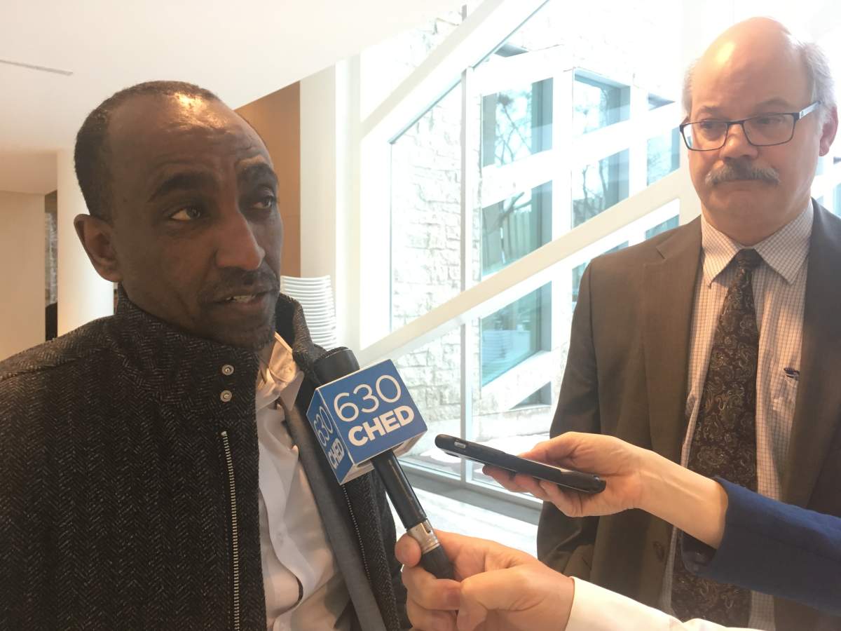 Nyala Lounge owner Moe Tesfay speaks at city hall Tuesday, Feb. 19, 2019.