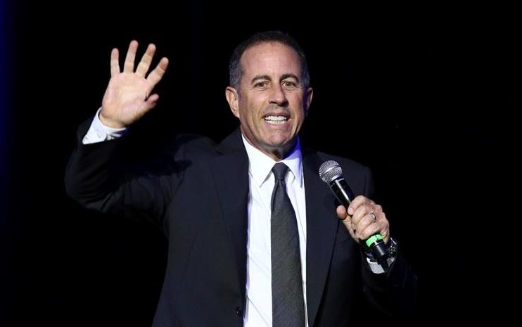 In this Nov. 1, 2016 file photo, Jerry Seinfeld performs at Stand Up For Heroes, at The Theater in New York's Madison Square Garden.