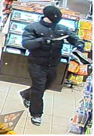 Police are seeking to identify a suspect after a robbery was reported at a business in Orillia.
