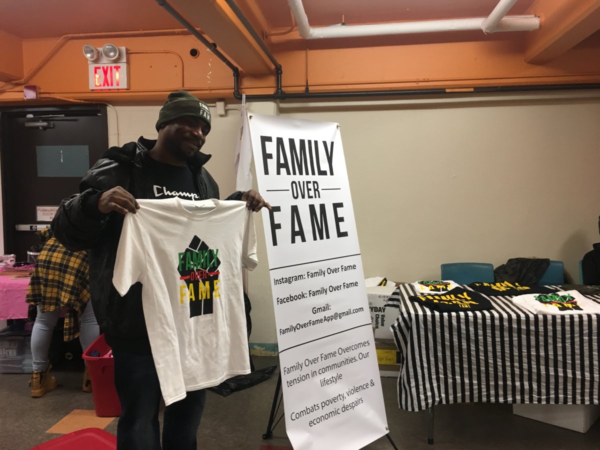 Tyrone Dixon shows off his new t-shirt at the inaugural Our Story Vendors Market in Halifax on Sun. Feb. 24, 2019. 