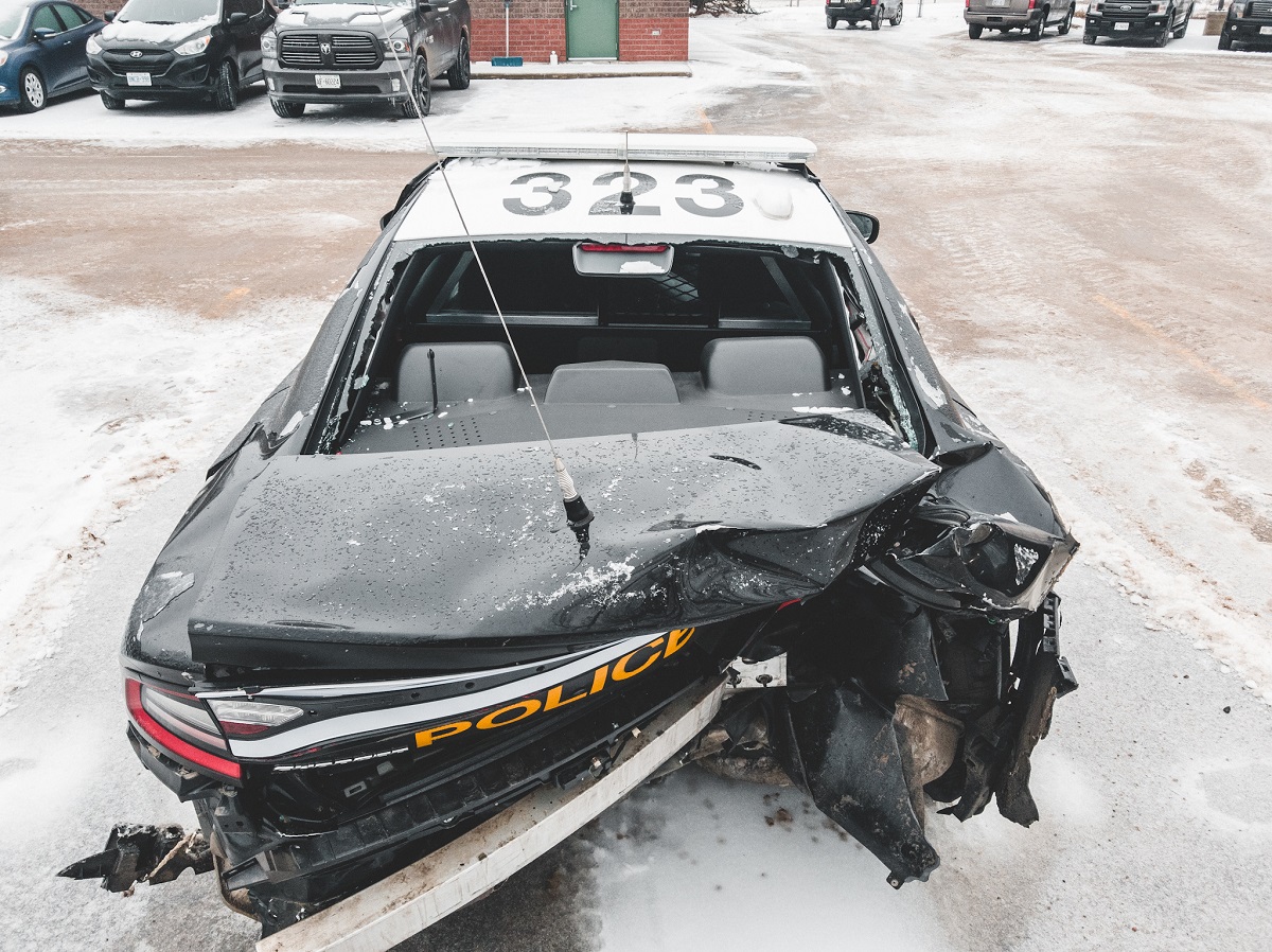 An OPP cruiser was struck by several tractor-trailers while officers were out of the vehicle responding to another jackknifed tractor-trailer.