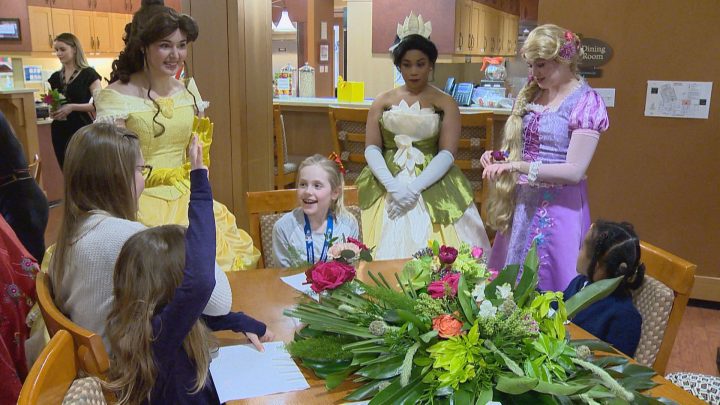 Disney princesses and Spider-Man stopped by Ronald McDonald House Southern Alberta with flower arrangements on Monday.