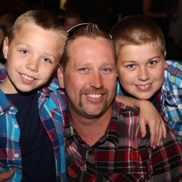 Rex Gill pictured with his sons when they were young.