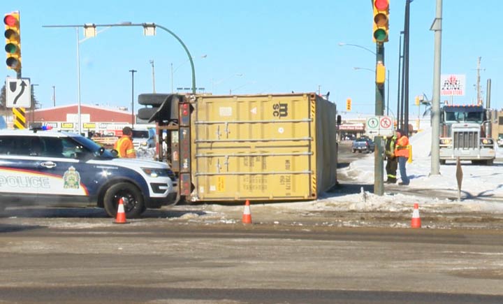 Saskatoon police said the semi was attempting a turn at the intersection when it rolled onto its side at Circle Drive and Avenue C North.