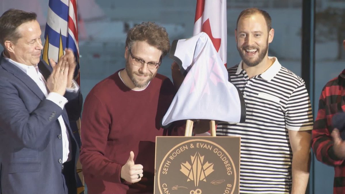 Seth Rogen and Evan Goldberg receive their Walk of Fame plaque at an event in Vancouver.