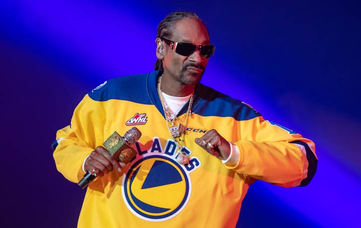 Snoop Dog dons a Saskatoon Blades hockey jersey while performing at SaskTel Centre on Feb. 19, 2019.