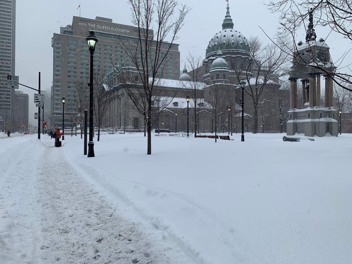 Snow covers the streets of Montreal after a winter storm, Wednesday., Feb. 13, 2019.