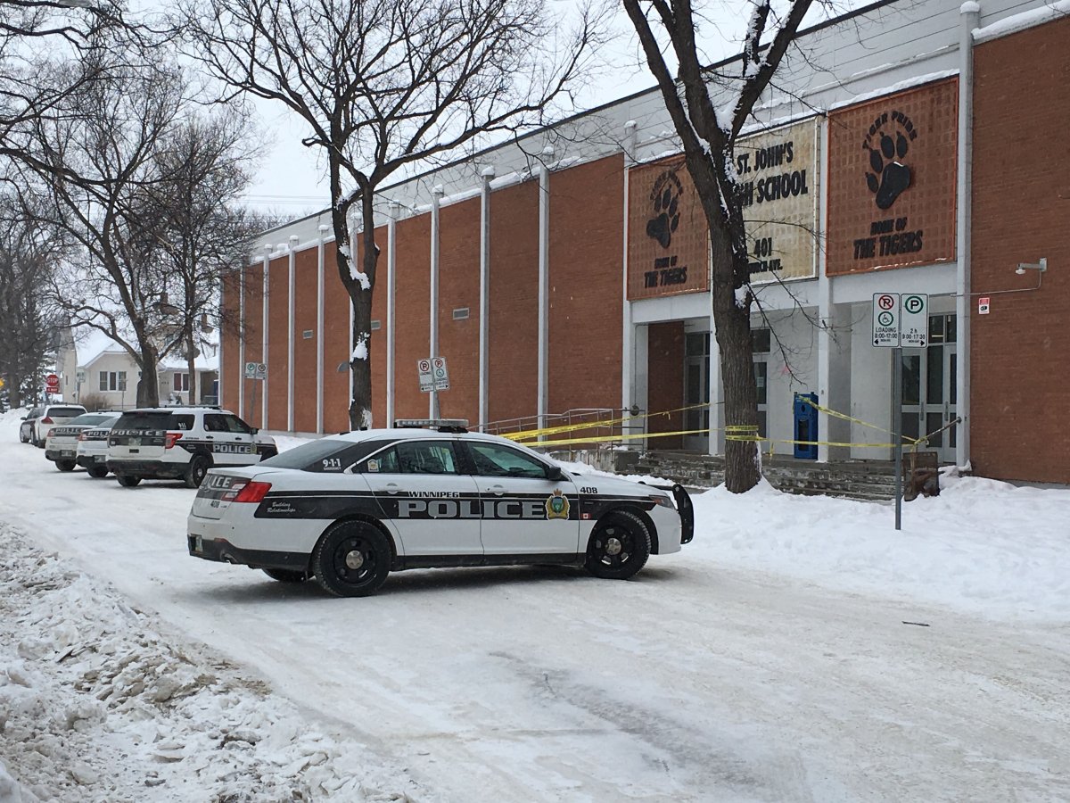 Police investigate an assault at St. John High School in Winnipeg.