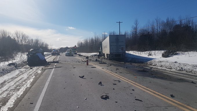 Police say one person is dead after a vehicle and transport truck collided on Highway 12. 