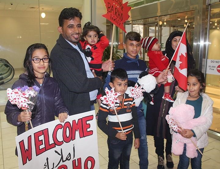 Members of the Barho family are shown upon arrival in Canada on Sept. 29 2017, at the Halifax airport in a handout photo.
