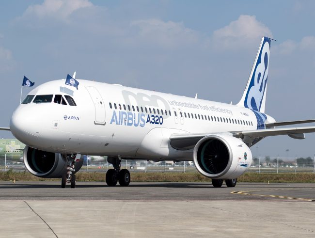 The new Airbus A320neo rolls on the runway of Toulouse-Blagnac airport, southwestern France, after successfully completing its first flight, Sept. 25, 2014.