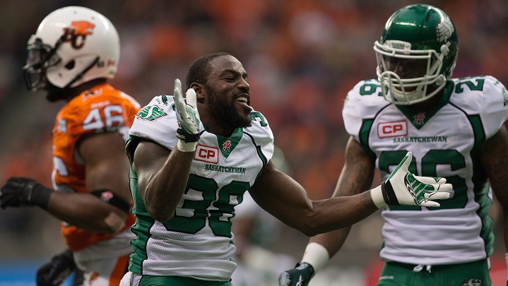 Saskatchewan Roughriders' Tristan Jackson (38) celebrates his kick return against the B.C. Lions as Anthony Allen (26) watches during the first half of a CFL football game in Vancouver, B.C., on Oct. 3, 2015. 