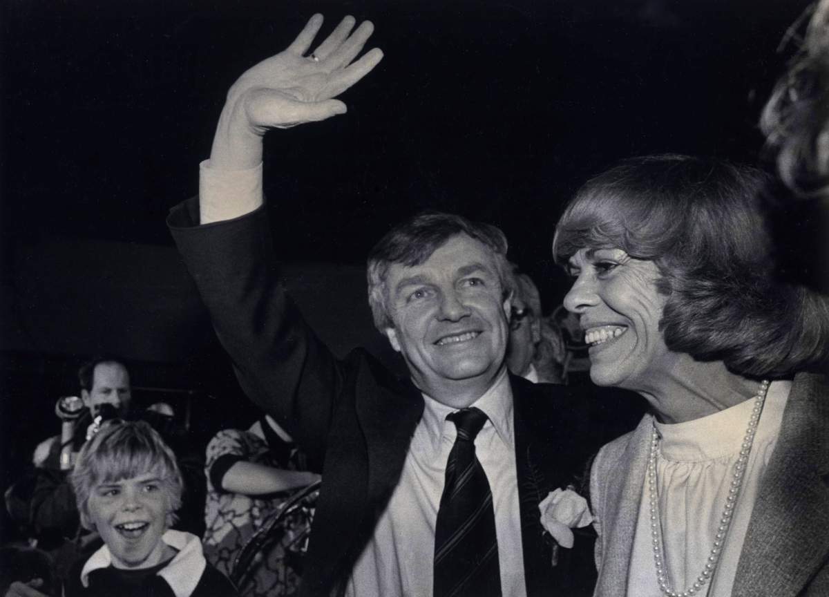 Progressive Conservative Party leader Peter Lougheed gives a victory wave to hundreds of party workers and supporters at his victory party at the Edmonton Inn on Thursday, March 15, 1979.