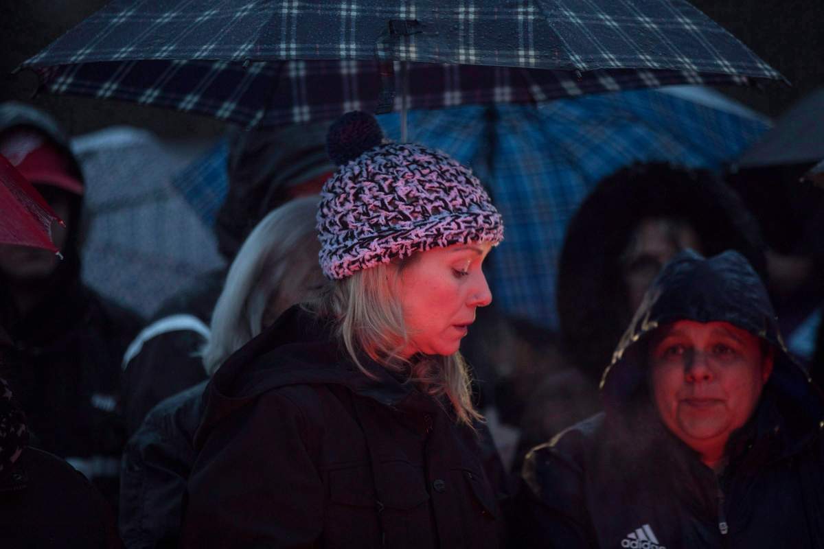 Michelle Hanson attends a vigil for her son Kaden Young in Belwood, Ontario on Wednesday April 25, 2018. Kaden Young, a three-year-old boy was swept from his mother's arms during a flood on Feb. 21. 