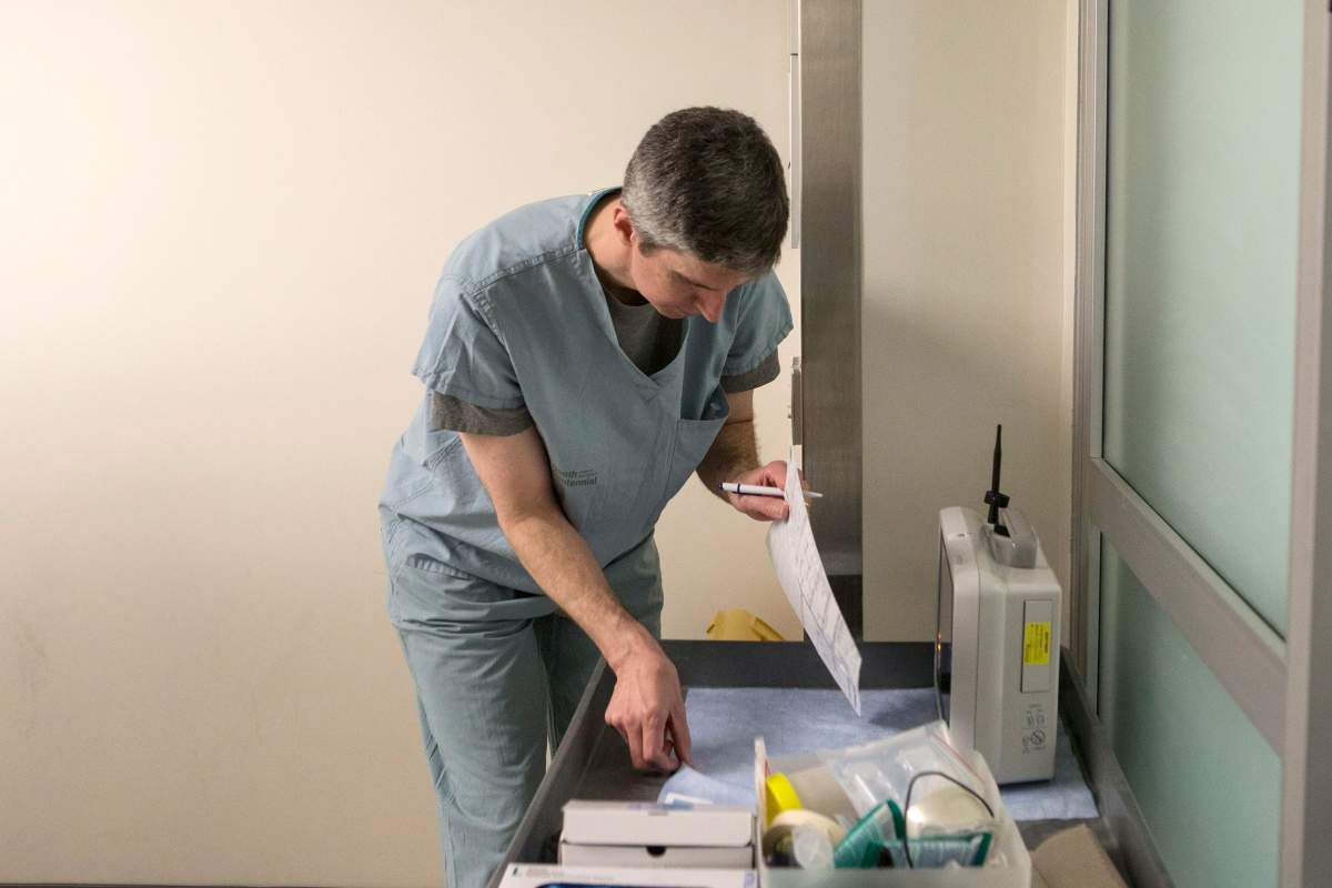 A member of a medical team is seen during a procedure at Toronto's Sunnybrook Hospital on Tuesday, May 1, 2018.