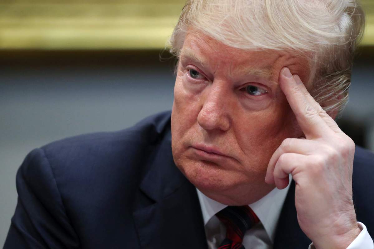 FILE - U.S. President Donald Trump participates in a briefing on "drug trafficking on the southern border" in the Roosevelt Room at the White House in Washington, U.S., March 13, 2019.
