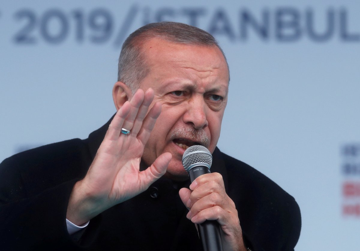 Turkish President Tayyip Erdogan addresses his supporters during a rally for the upcoming local elections, in Istanbul, Turkey March 12, 2019. 