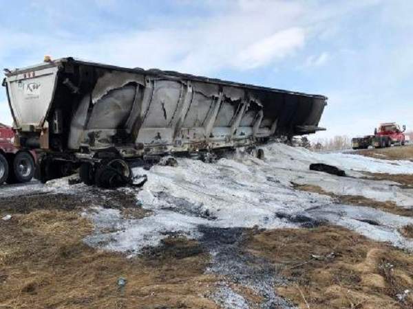 The remnants of the salt truck that police say caught fire as it was travelling eastbound down Highway 401 near Chatham.