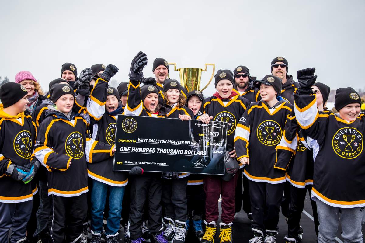 The West Carleton Warriors peewee hockey team celebrates after winning Chevrolet's Good Deeds Cup and a $100,000 grand prize, which will go towards tornado relief efforts in Ottawa's rural west end.