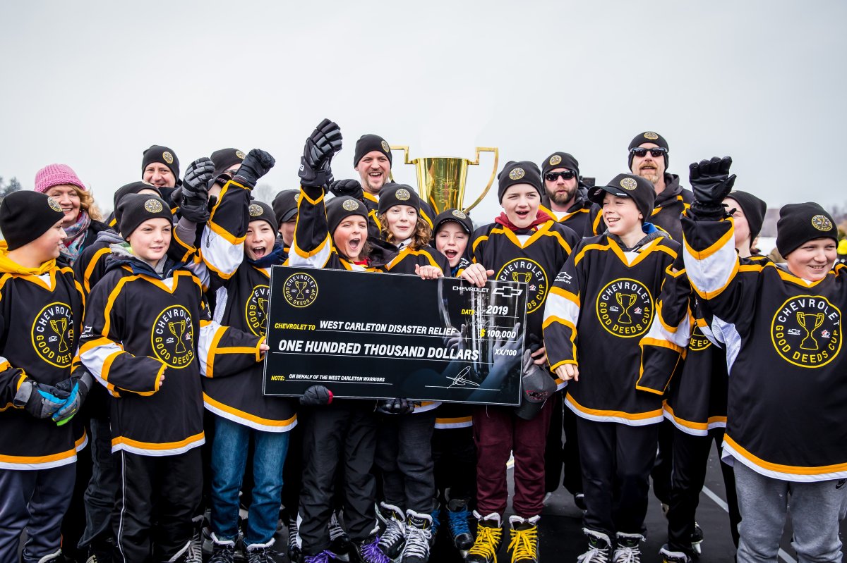 The West Carleton Warriors peewee hockey team celebrates after winning Chevrolet's Good Deeds Cup and a $100,000 grand prize, which will go towards tornado relief efforts in Ottawa's rural west end.