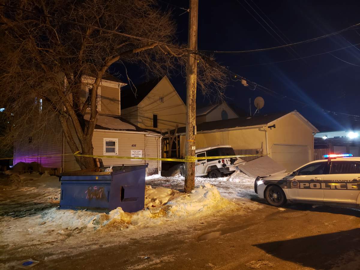 The back alley behind Langside Street near Ellice Avenue was closed off for the investigation.