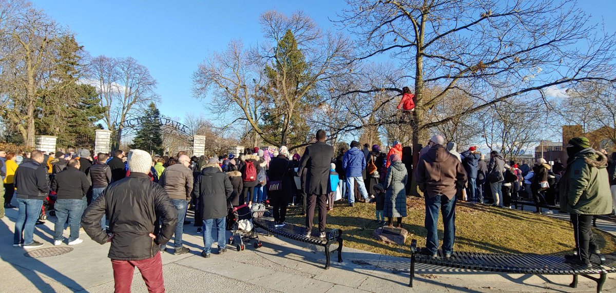 Organizers say a crowd of between 150 and 200 people gathered for a rally at Victoria Park on Monday. 