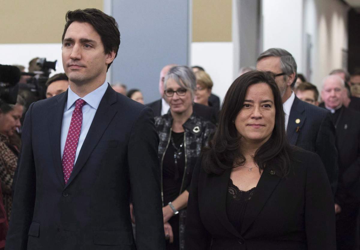 Prime Minister Justin Trudeau and Minister of Justice and Attorney General of Canada Jody Wilson-Raybould take part in the grand entrance as the final report of the Truth and Reconciliation commission is released, Tuesday December 15, 2015 in Ottawa.  THE CANADIAN PRESS/Adrian Wyld
