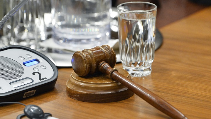 Austyn Adamko is charged with criminal negligence causing death, careless use of a firearm, unauthorized possession of a firearm, and possession of a firearm in a motor vehicle.