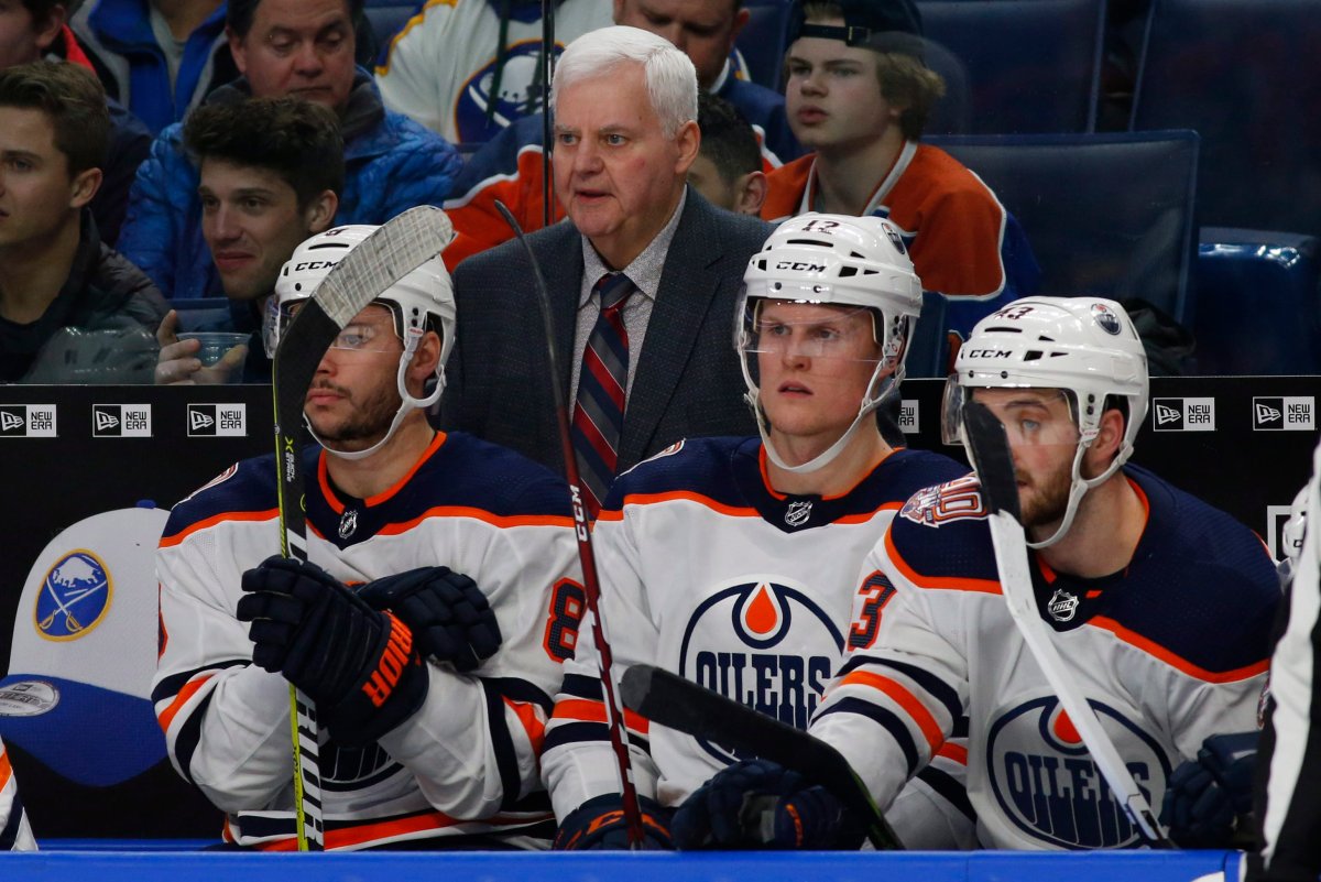 Edmonton Oilers head coach Ken Hitchcock, top center, looks on during the third period of an NHL hockey game against the Buffalo Sabres, Monday, March 4, 2019, in Buffalo N.Y. (AP Photo/Jeffrey T. Barnes).