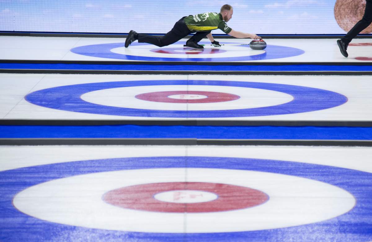 Team Northern Ontario skip Brad Jacobs makes a shot during the 13th draw against team Yukon at the Brier in Brandon, Man. Wednesday, March 6, 2019.