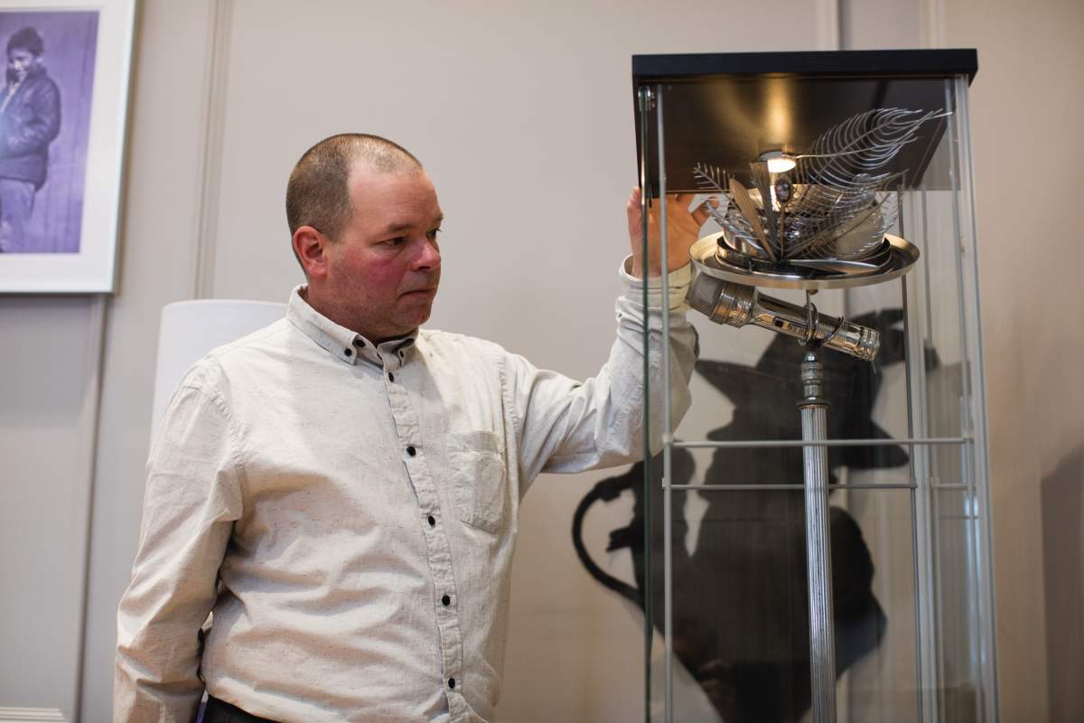 Dartmouth artist Al Hattie poses with his Gord Downie tribute sculpture, created from recycled and upcycled materials called "The Last Show," in the Legacy Room at Halifax City Hall on Friday, March 15, 2019.