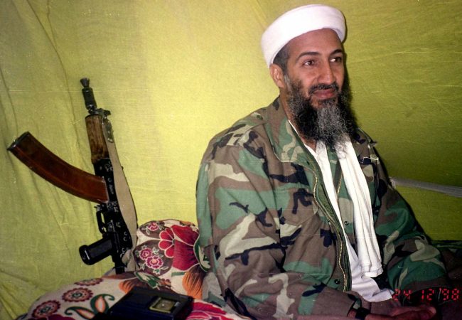 In this Dec. 24, 1998, file photo, al-Qaida leader Osama Bin Laden speaks to a selected group of reporters in mountains of Helmand province in southern Afghanistan.
