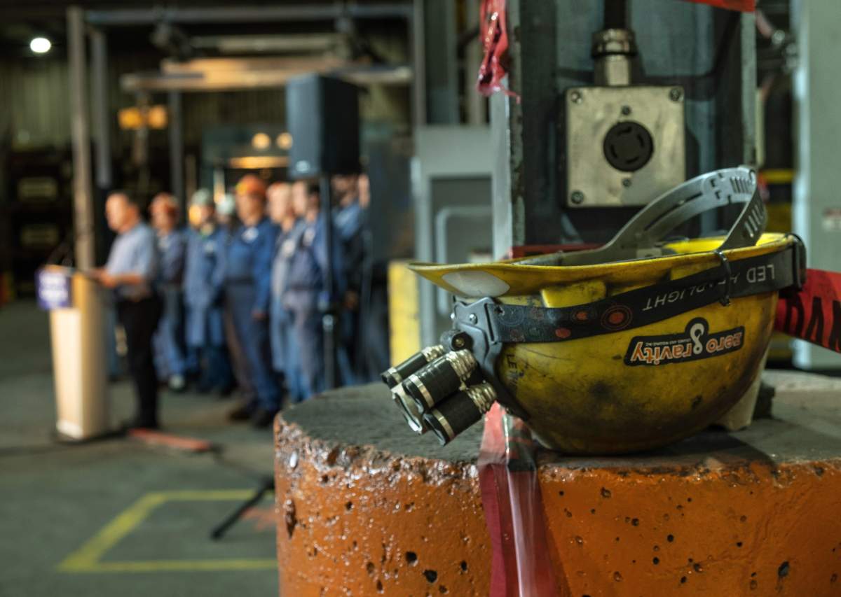 A helmet is seen as United Conservative Party Leader Jason Kenney speaks during a press conference at Lethbridge Iron Works in Lethbridge, Alta., on Wednesday, March 20, 2019. 