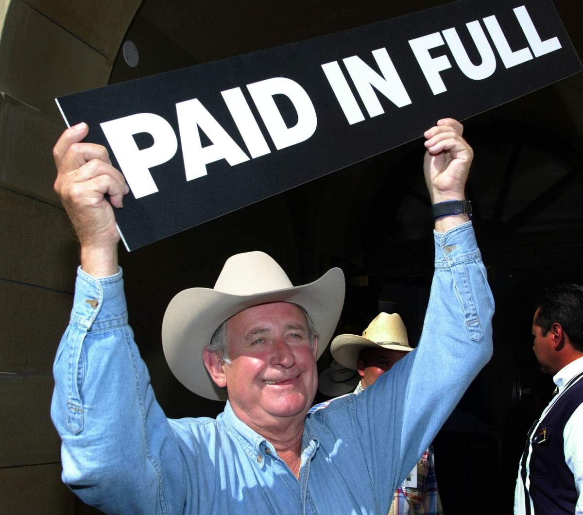 Alberta Premier Ralph Klein announces in Calgary, Monday, July 12, 2004, that Alberta has paid its $3.7 billion debt.
