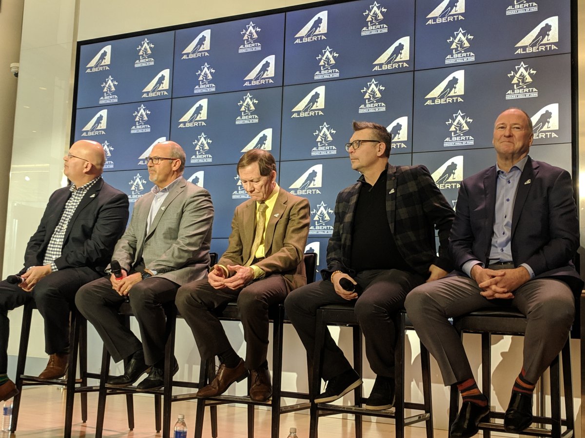 Scott McCrady and Daryl Henry of the 1987 and 1998 Medicine Hat Tigers, Duncan MacDougall, Theo Fleury, and Kevin Lowe will enter the Alberta Hockey Hall of Fame in 2019. They gathered at Rogers Place on March 7, 2019.