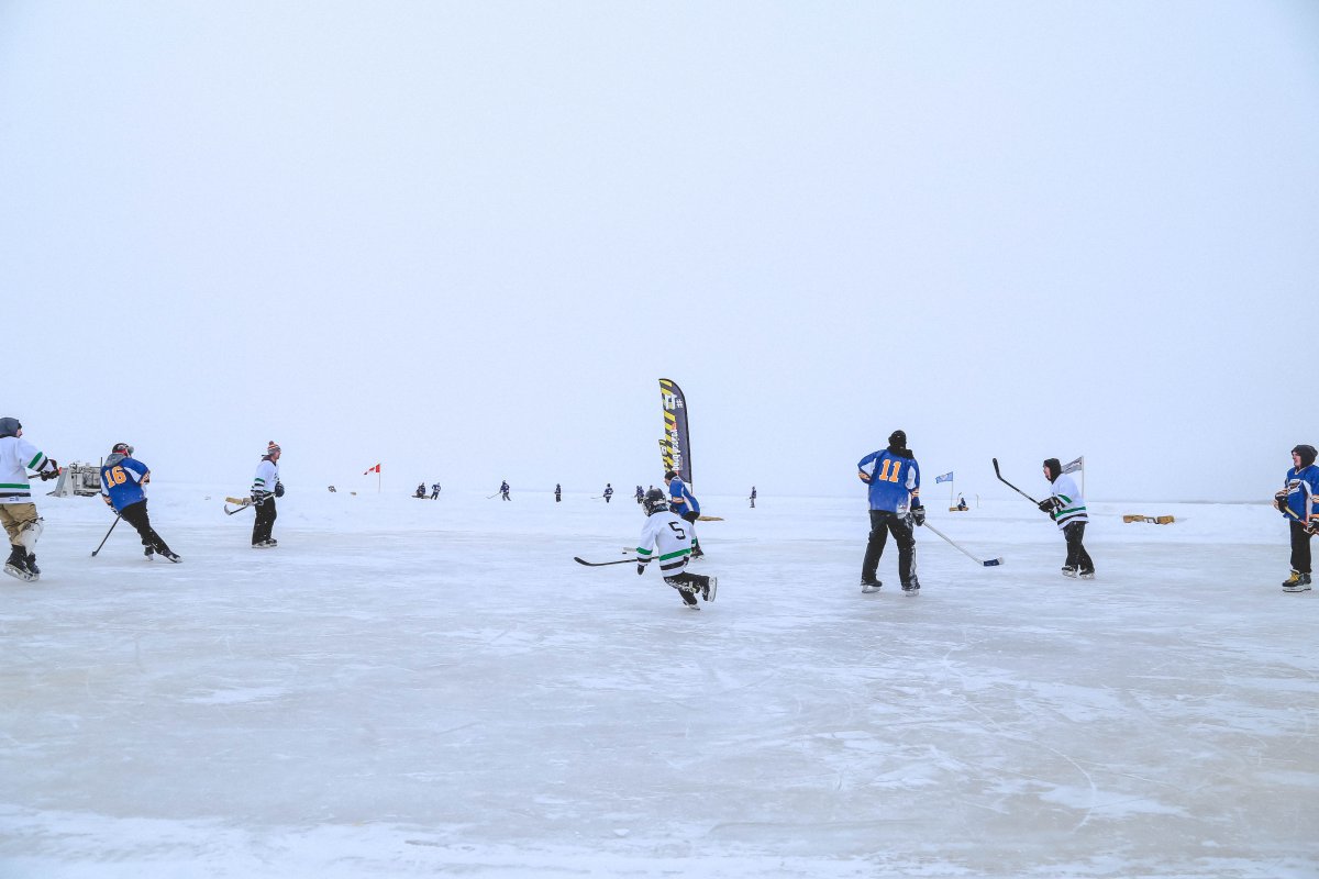 Players skate on the frozen Lac Cardinal during the 2017 Alberta Pond Hockey Championships. Sixty-four teams are entered in this year's event, which runs March 8-10.