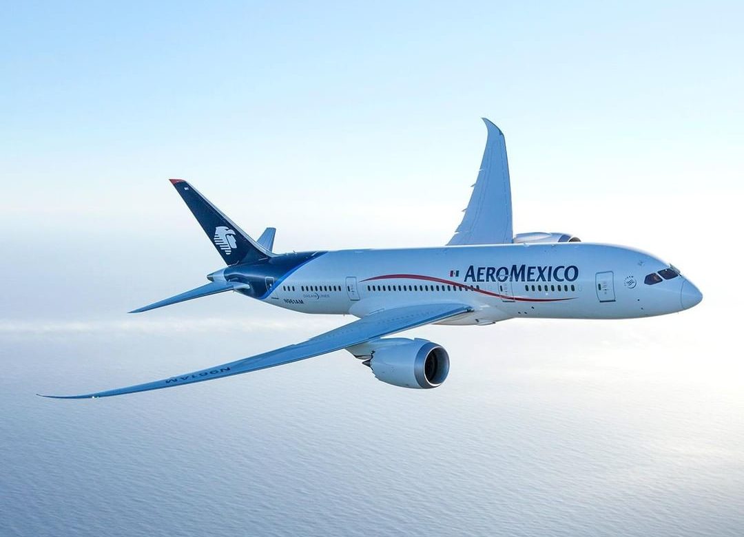 An Aeromexico plane is shown in the sky.