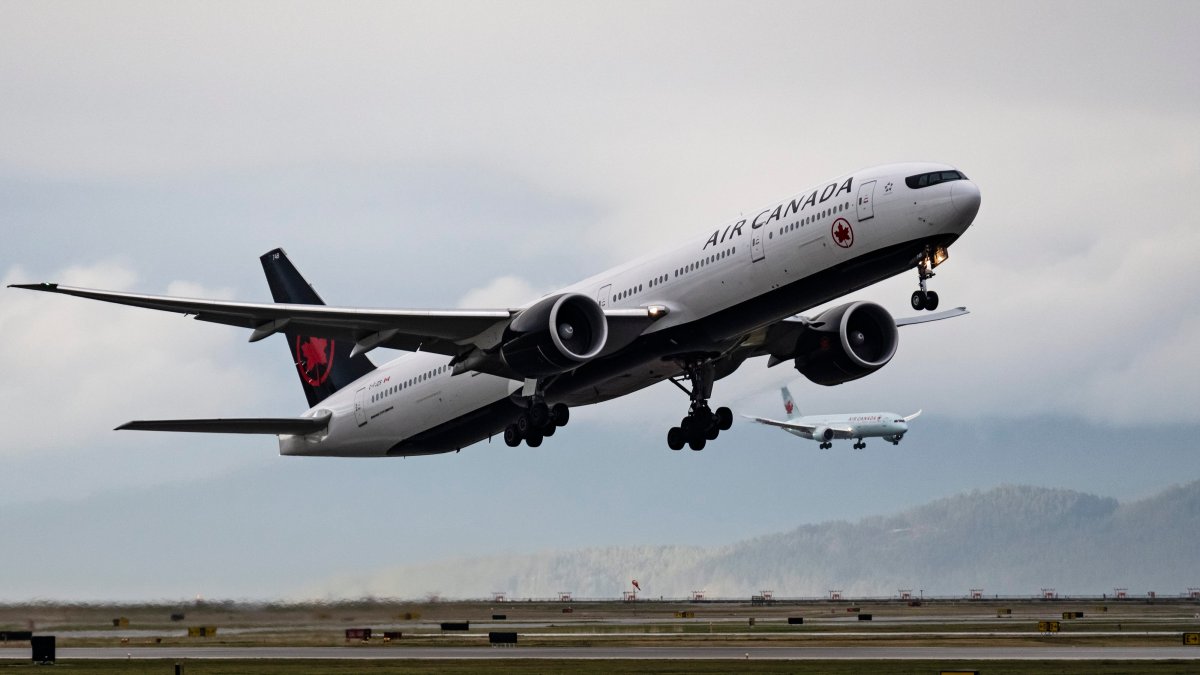 An Air Canada jet takes off from the Vancouver International Airport.