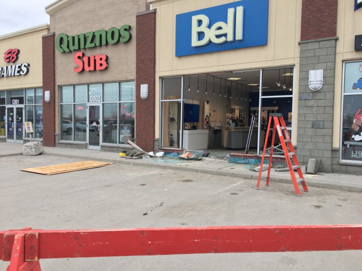 Vehicle crashes into Bell storefront in Kingston RioCan Centre
