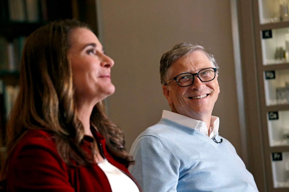 In this Feb. 1, 2019, photo, Bill Gates looks to his wife Melinda as they are interviewed in Kirkland, Wash.