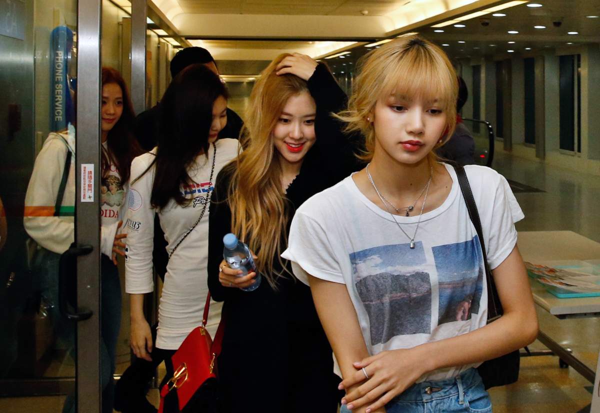 Lisa and Rose of South Korean girl group Blackpink arrive at an airport on March 2, 2019 in Taipei, Taiwan of China.