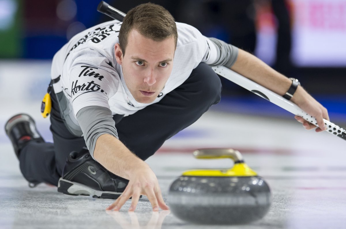 Team Wildcard skip Brendan Bottcher makes a shot during the 18th draw against team Ontario at the Brier in Brandon, Man. Friday, March, 8, 2019. 