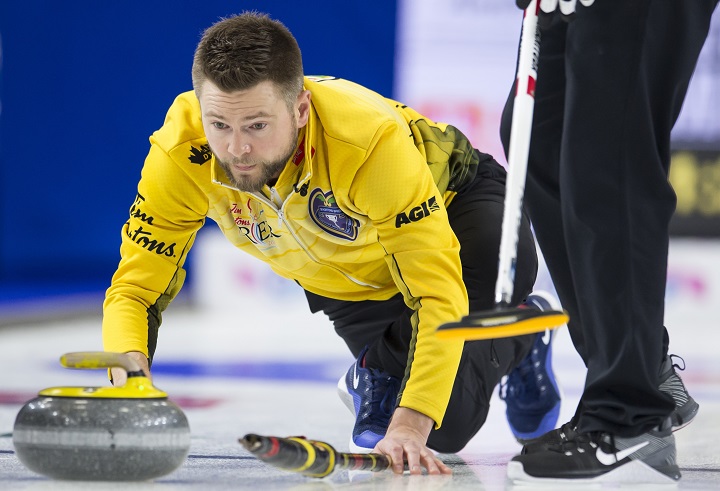 Team Manitoba skip Mike McEwen makes a shot during the 18th draw against team British Columbia at the Brier in Brandon, Man. Friday, March 8, 2019. 