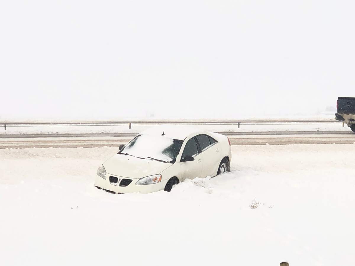 Vehicles in the ditch along the QEII/Highway 2 near Red Deer, Alta., on Friday, March 8, 2019.