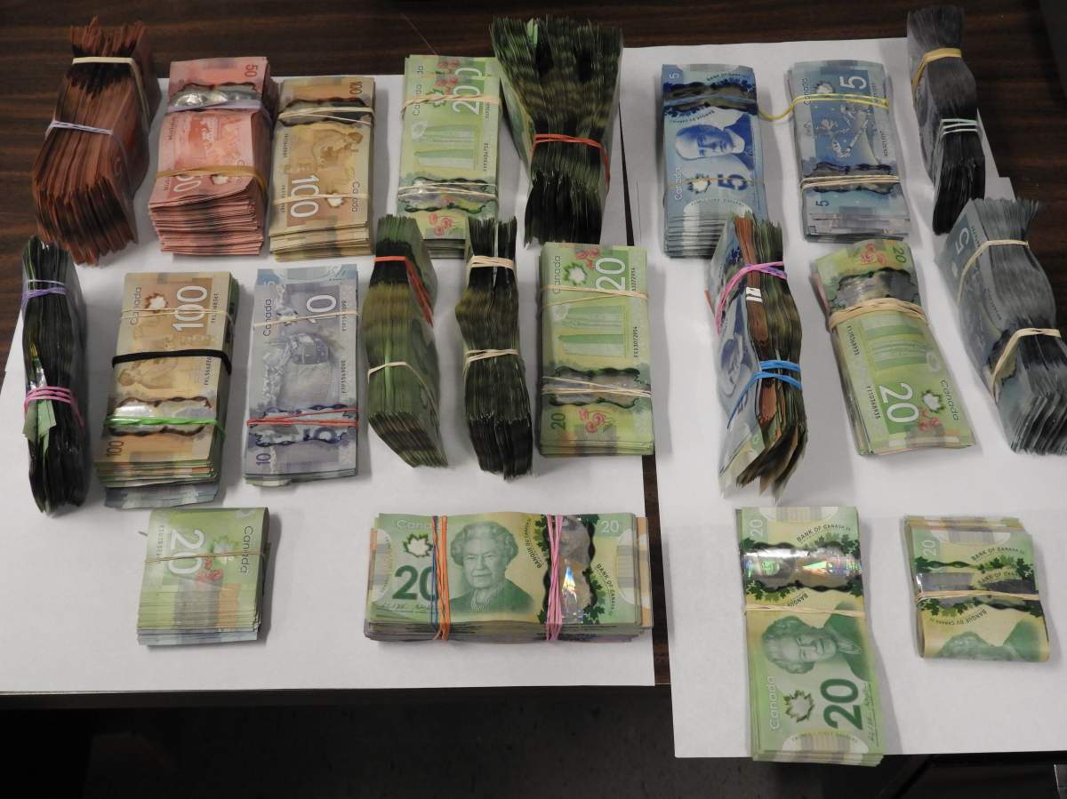 Peterborough police seized $50,000 in cash as part of a drug probe Wednesday.