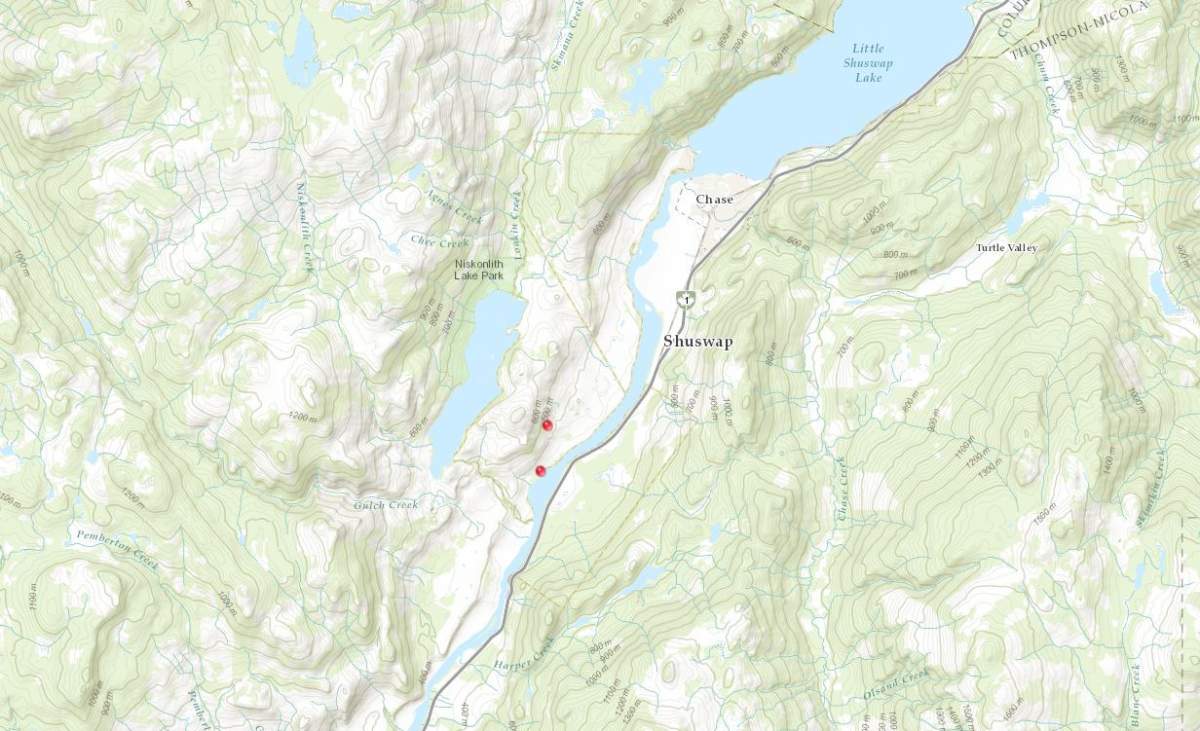 The red dots show the locations of the two small wildfires burning in the B.C. interior.
